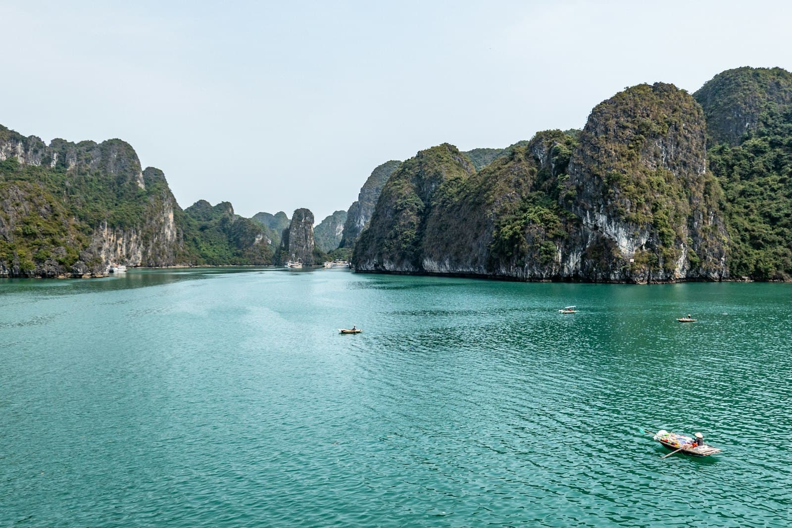 Ha Long — body of water near mountain during daytime