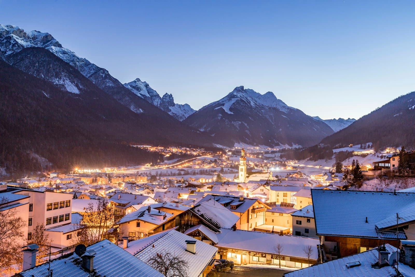Hall in Tirol — white concrete houses near mountain