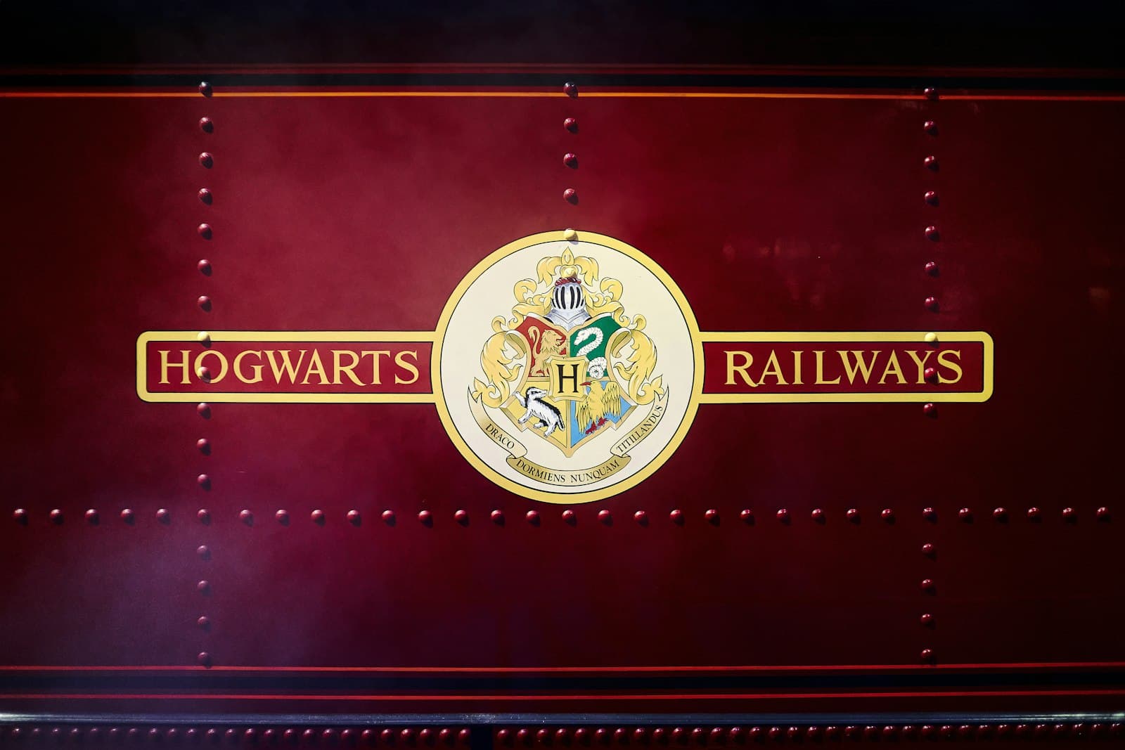 Harry Potter's London — the hogwarts railway logo on the side of a train