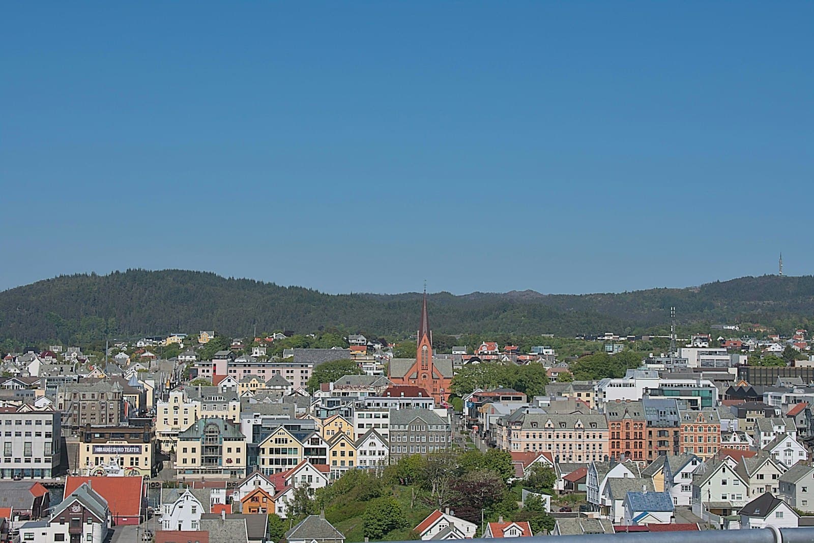 Haugesund — a view of a city with mountains in the background