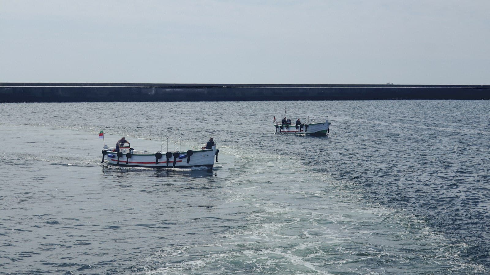 Heligoland — a couple of boats that are in the water