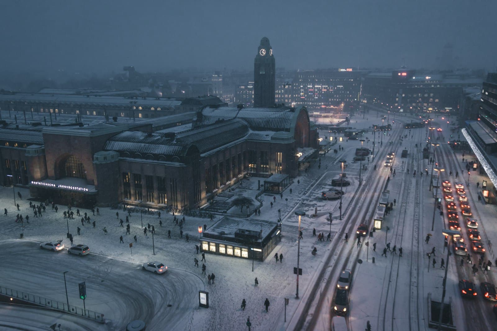 Helsinki — aerial photography of street at night covered with snow