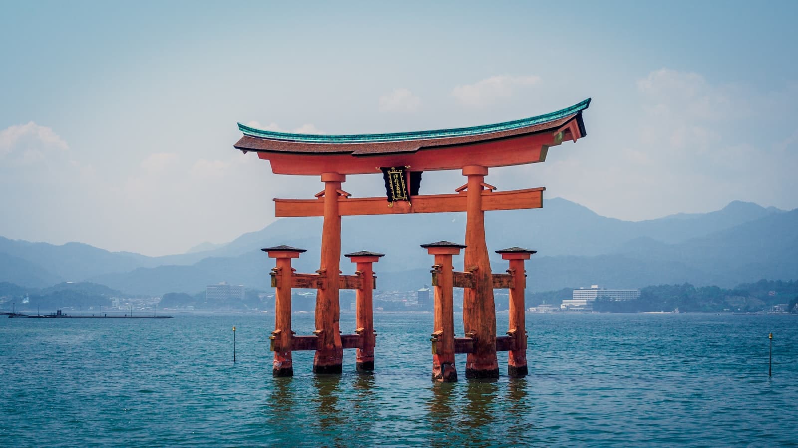 Hirosaki — red shrine in body of water