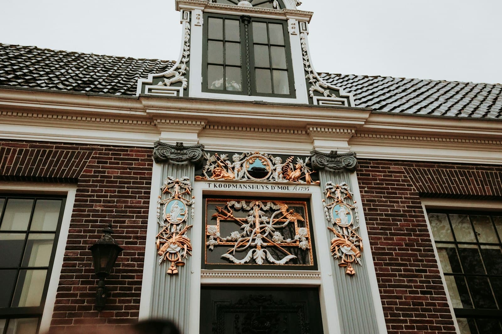 Holland — An ornate dutch building facade with detailed architectural elements.