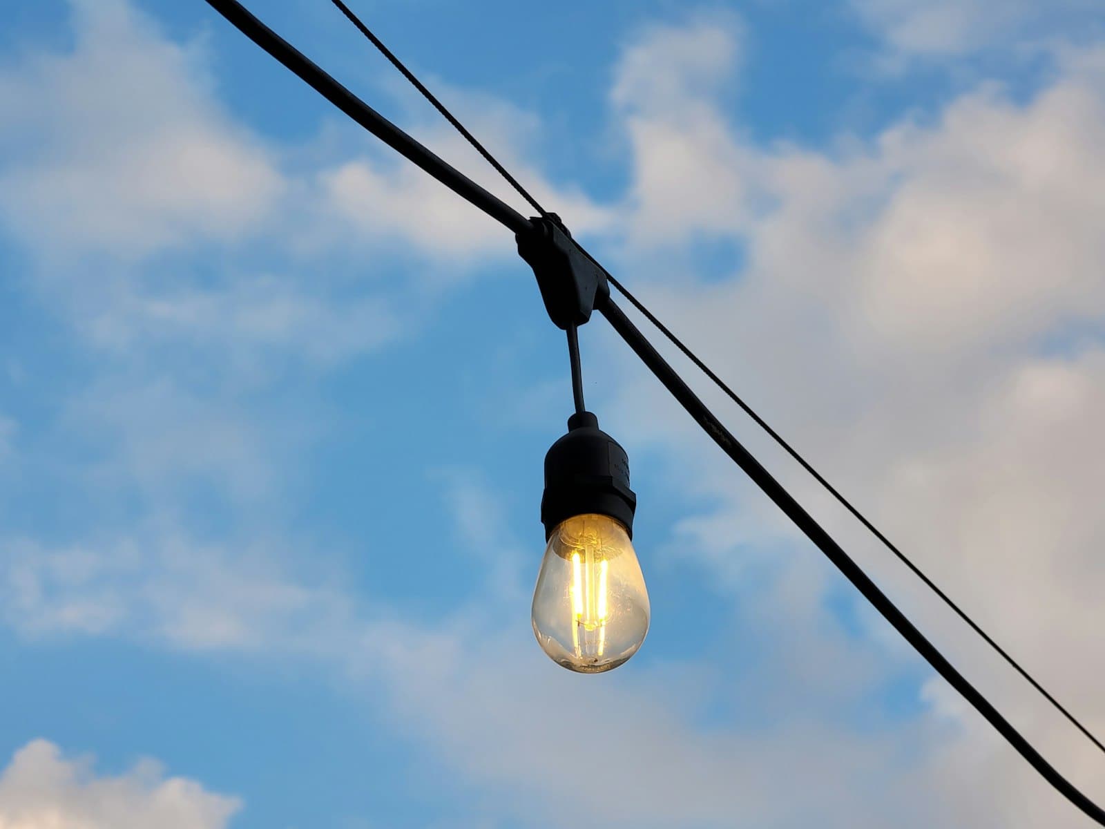 Holly Springs — a light bulb hanging from a power line