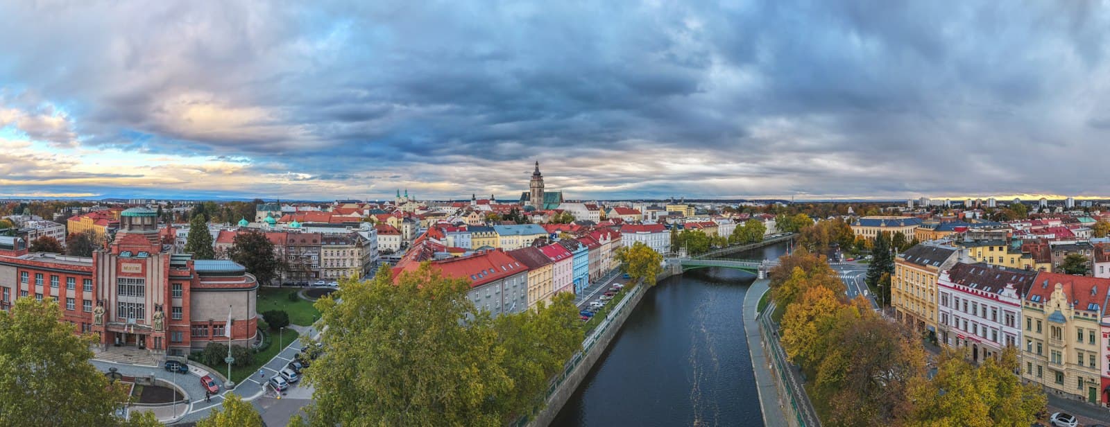 Hradec Králové — Cityscape with a river and cloudy sky