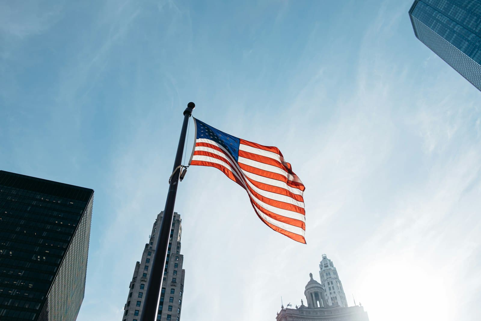 Hudson — USA flag on pole at the city during day