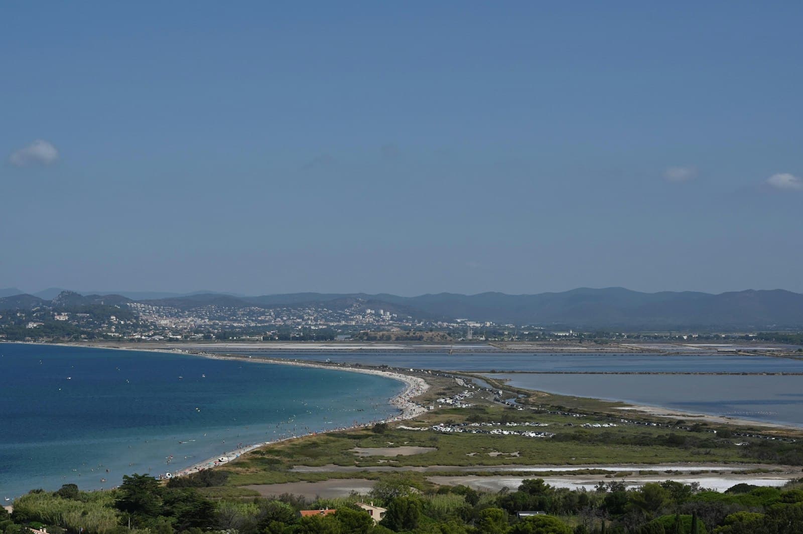 Hyères — body of water near green grass field during daytime