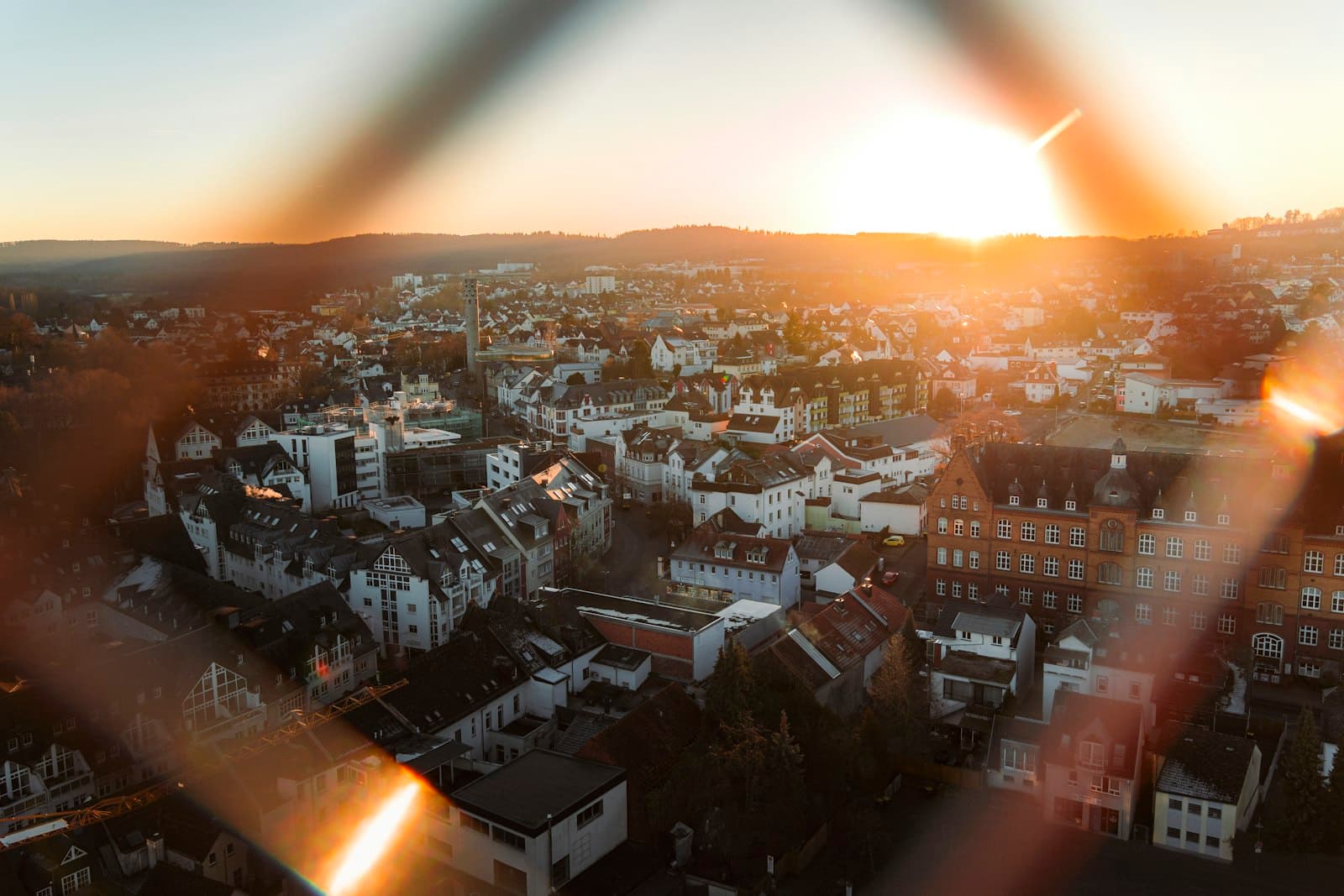 Idstein — Sunset over a european town with lens flares