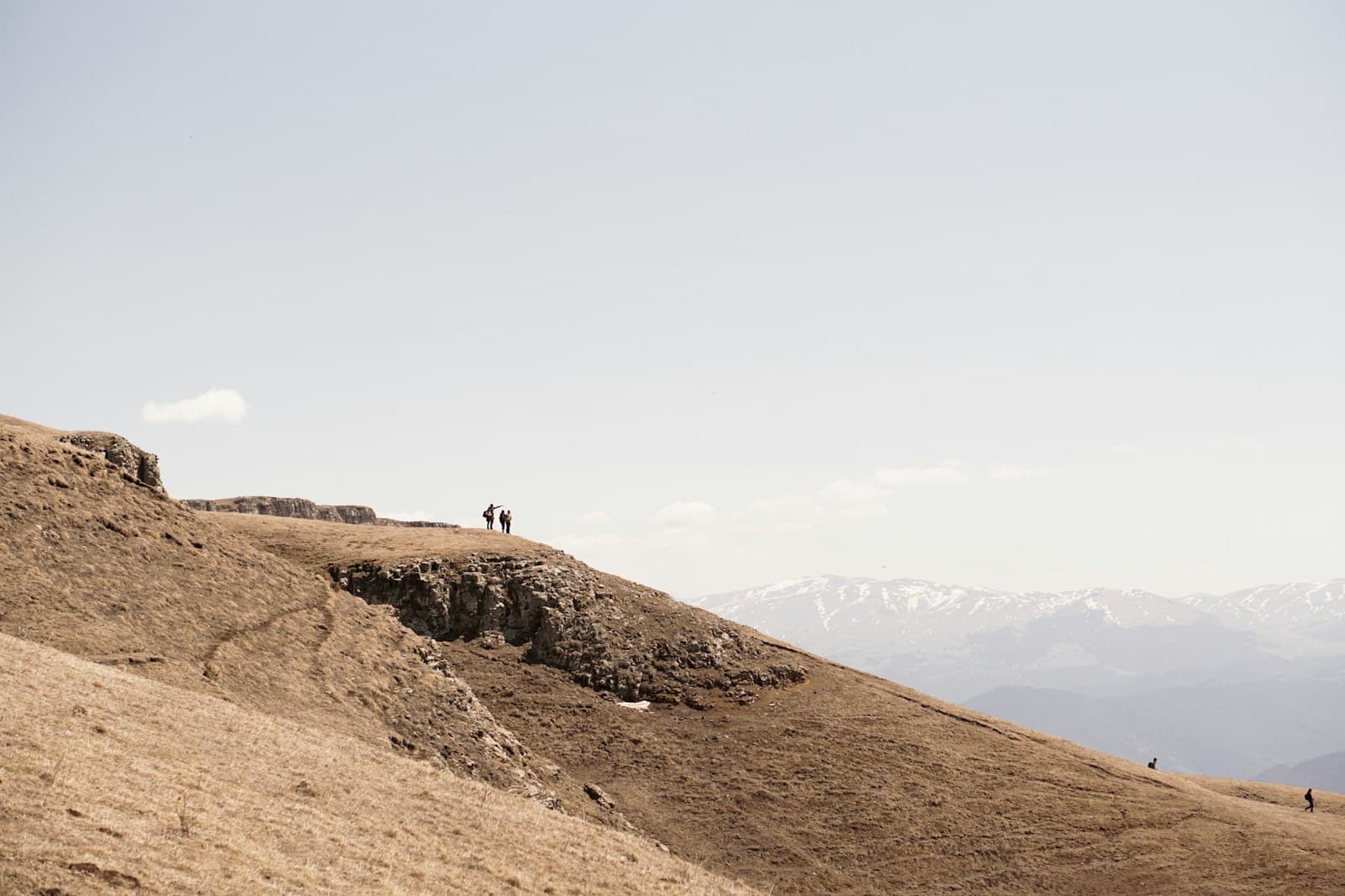 Ijevan — a couple of people standing on top of a hill