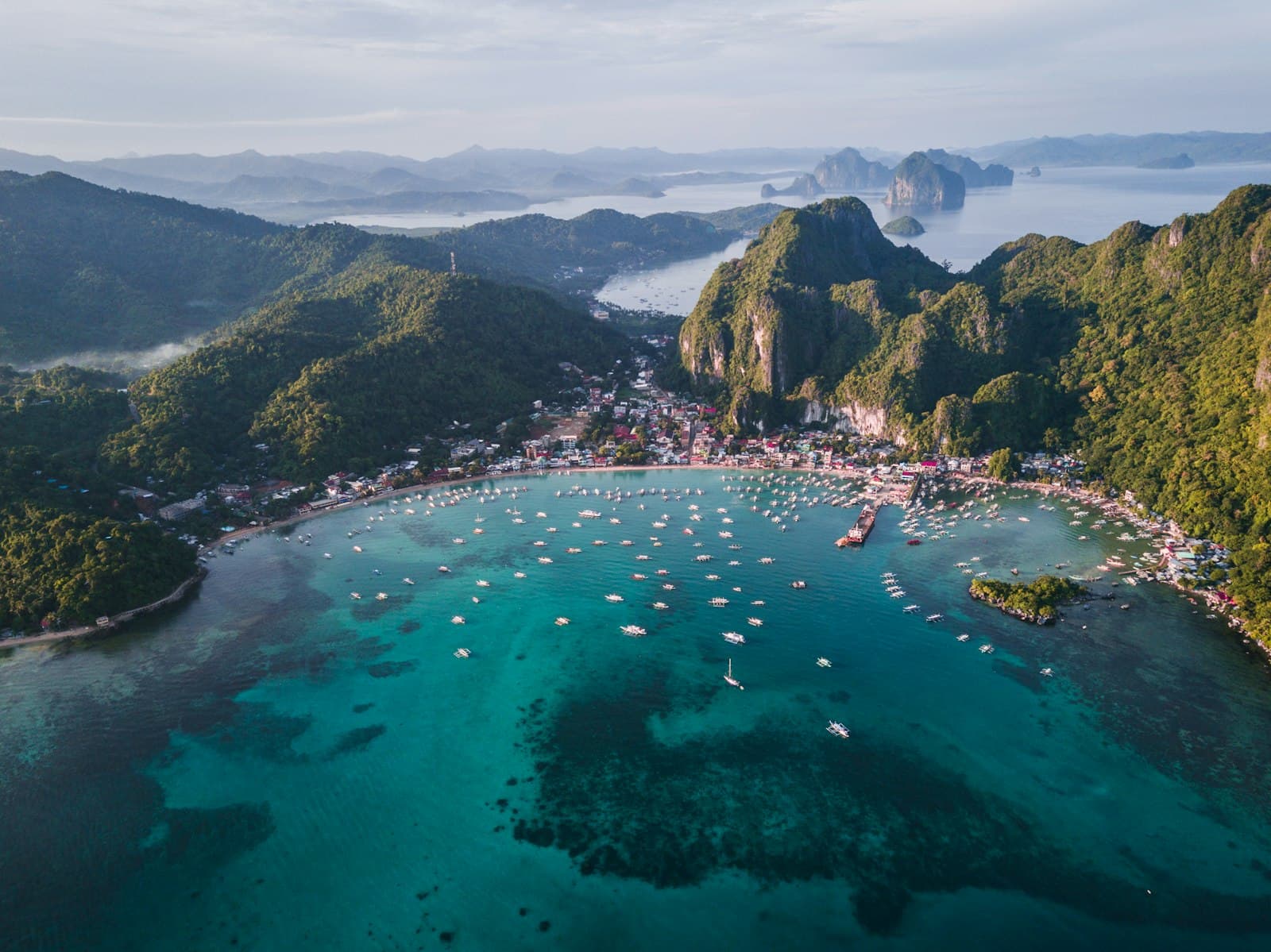 Iloilo — landscape photography of island with boats