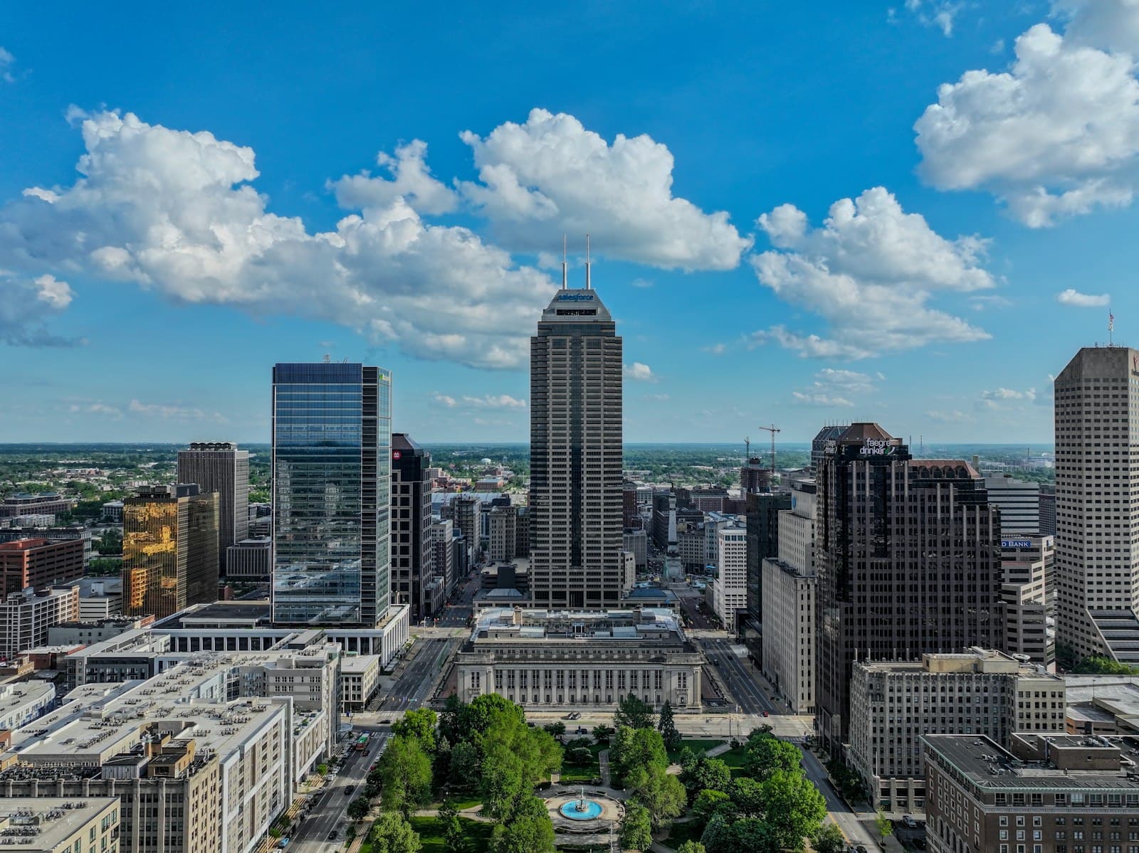 Indianapolis — Indianapolis skyline featuring tall buildings and blue sky.