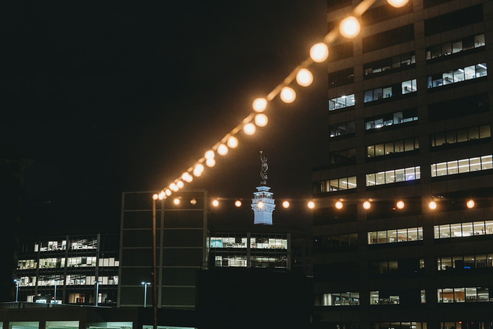 Indianapolis — String lights illuminate buildings at night