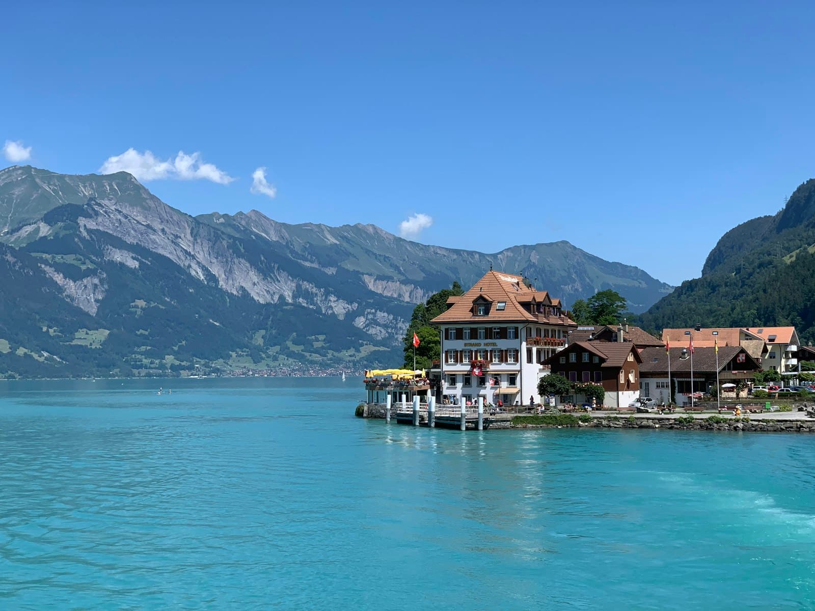 Interlaken — houses near body of water and mountain range