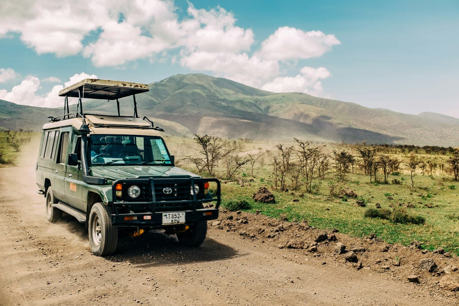 Iringa — black jeep wrangler on dirt road during daytime