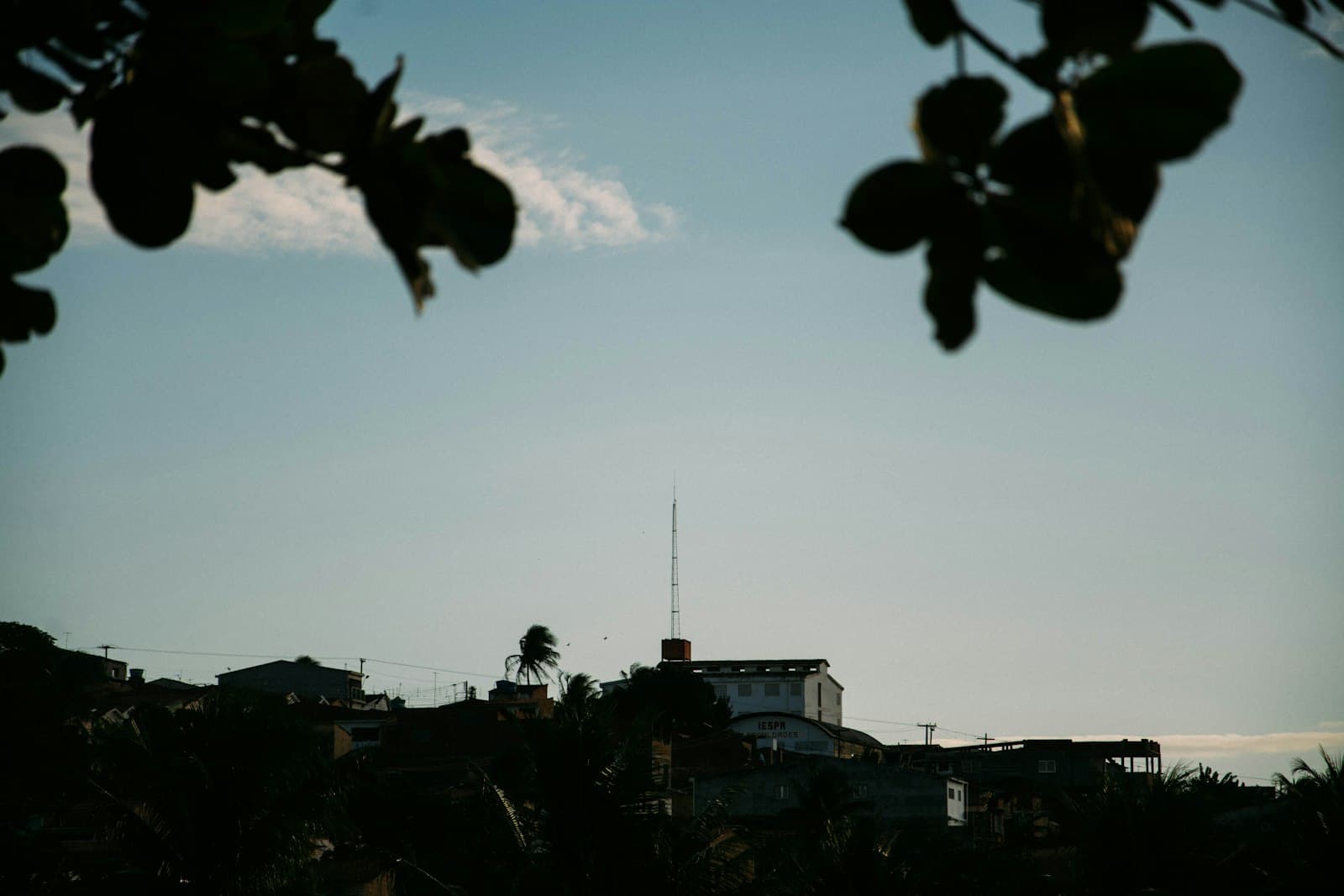 João Pessoa — white house beside tower under cloudy sky during daytime