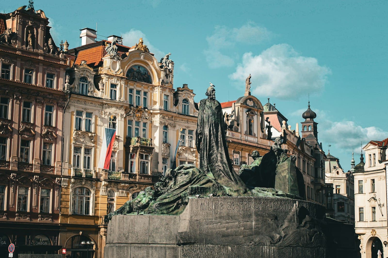 Kafka's Prague — a statue of a woman in front of a building
