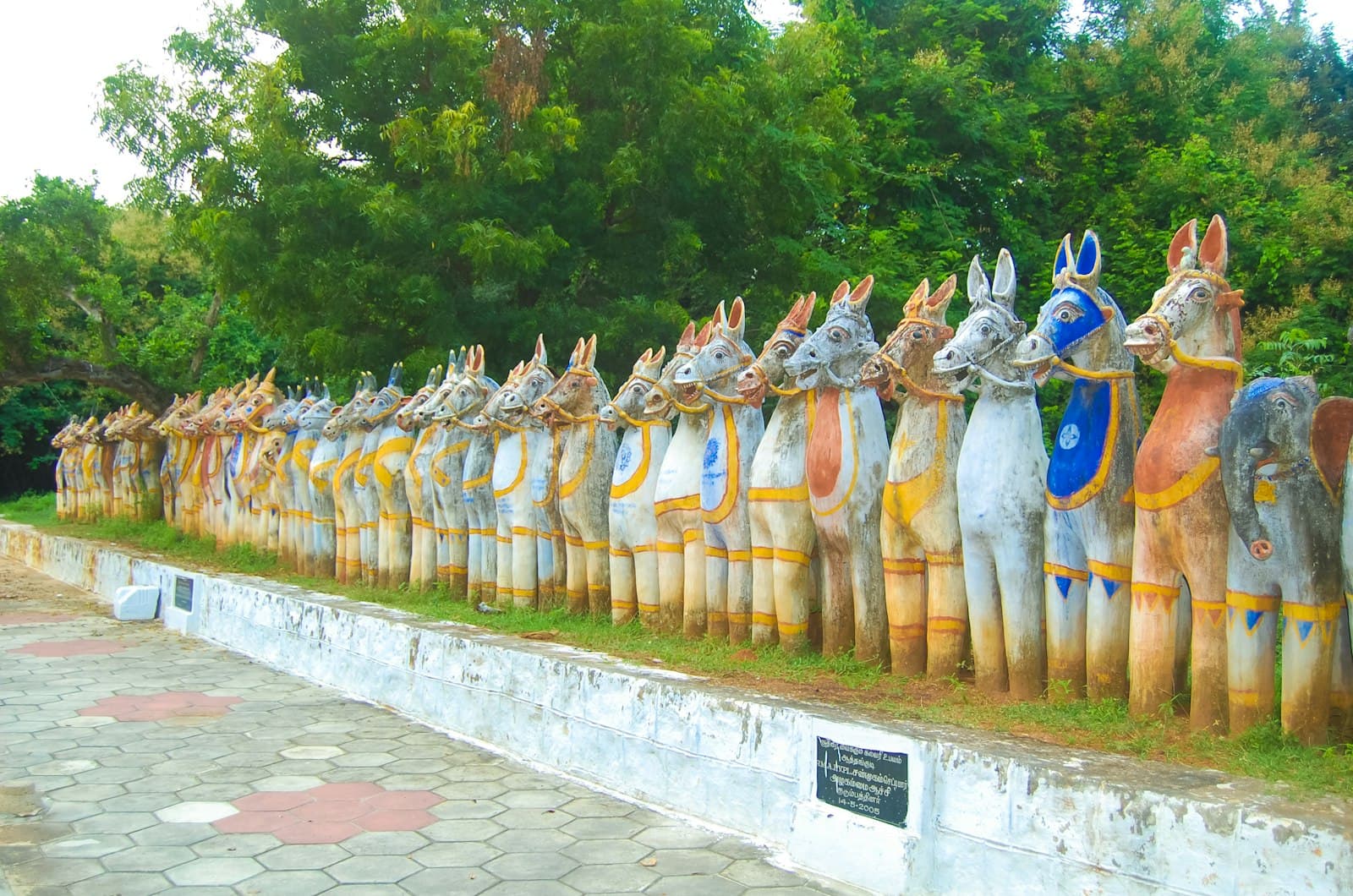 Karaikudi — a long row of wooden statues of horses