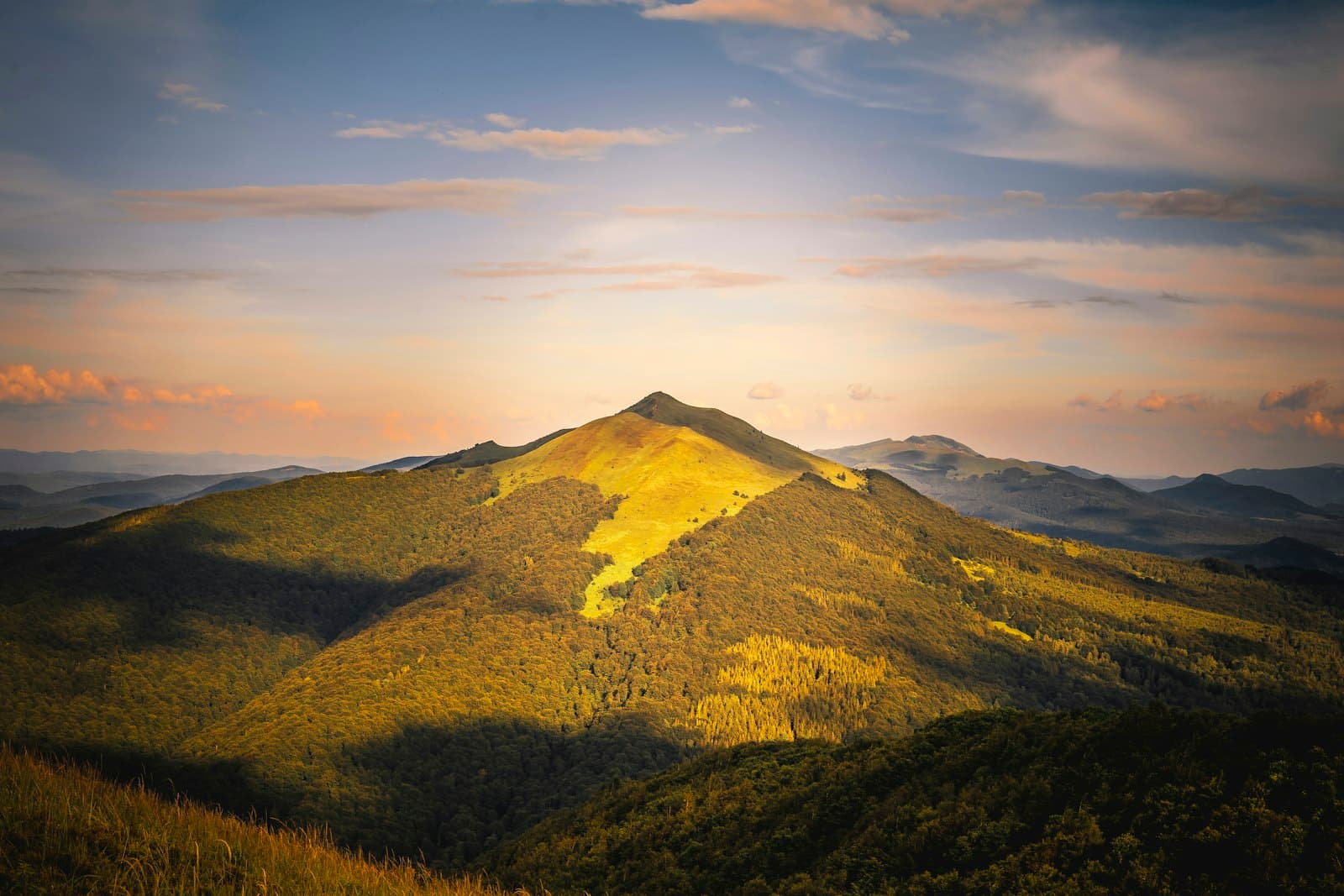 Kazimierz Bieszczady — green and brown mountain under white clouds during daytime