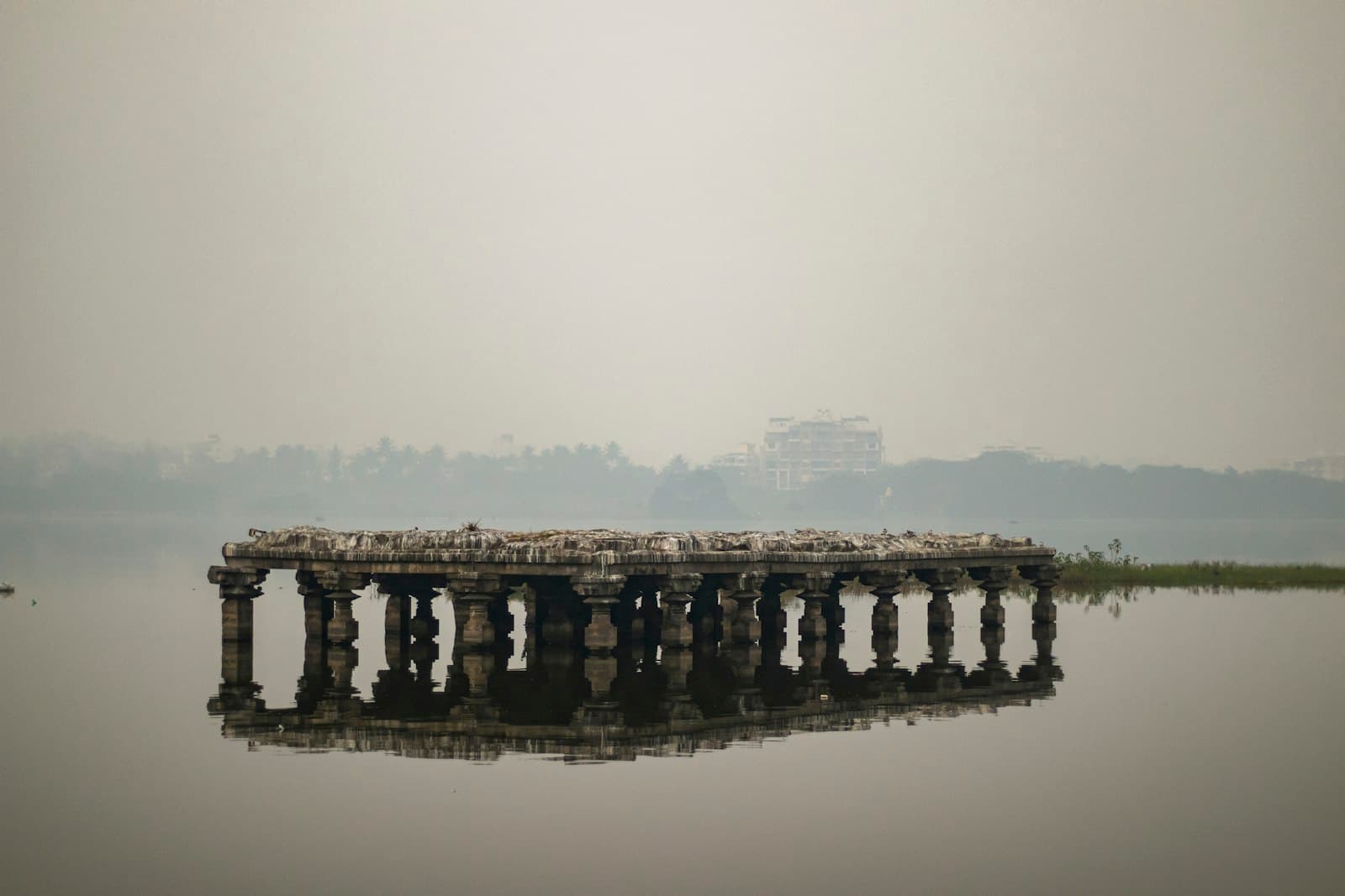 Kolhapur — a large body of water with a pier in the middle of it