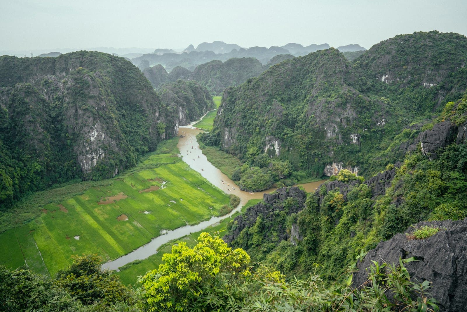 Kon Tum — a river running through a lush green valley