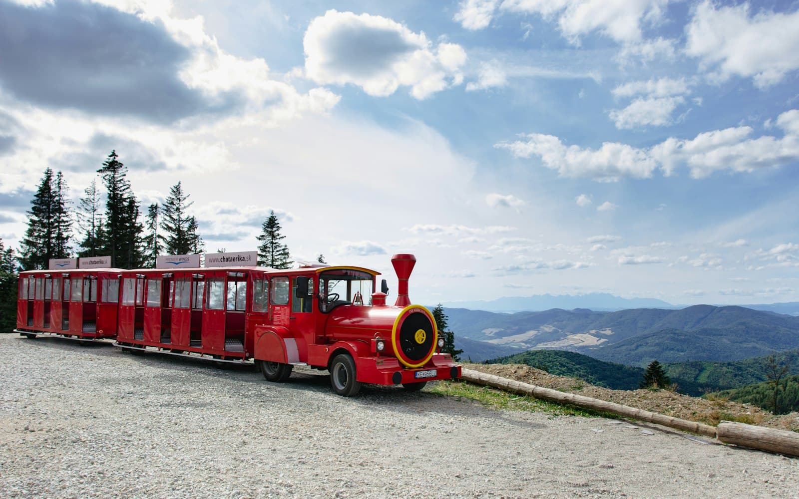 Košice — a red train is on the tracks near a mountain