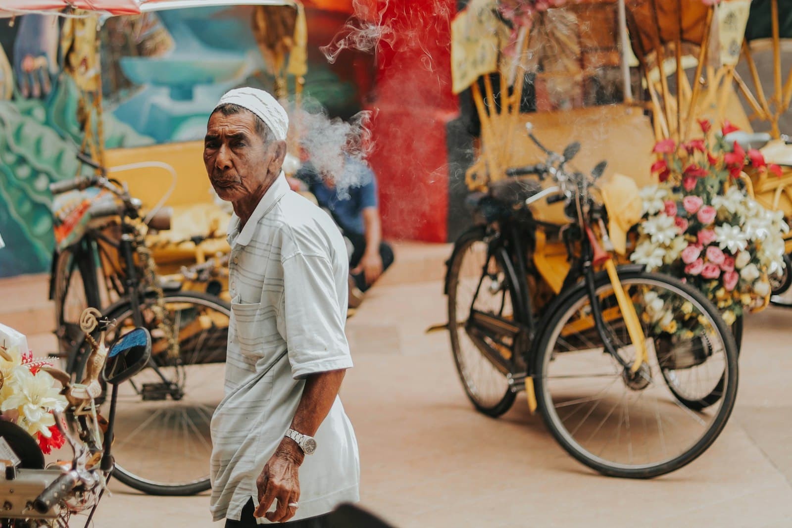 Kota Bharu — man standing near black bicycle