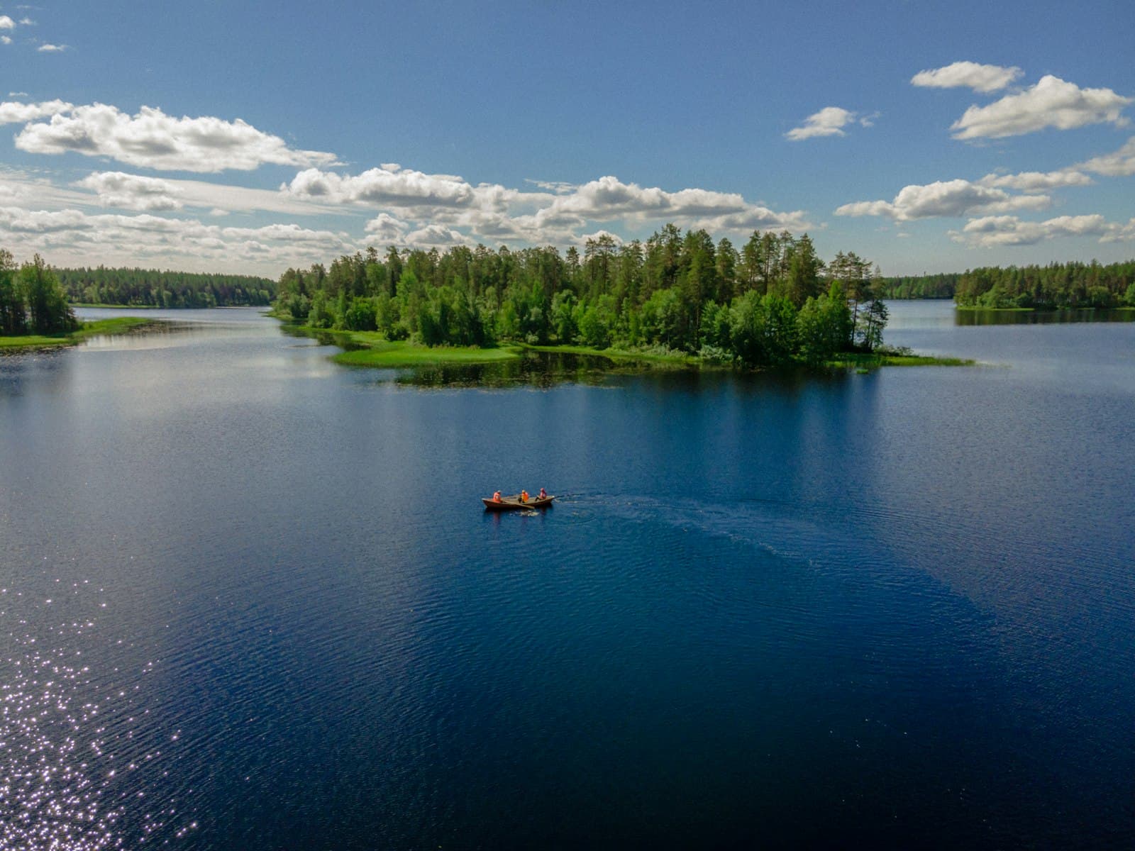 Kouvola — person riding on kayak on lake during daytime