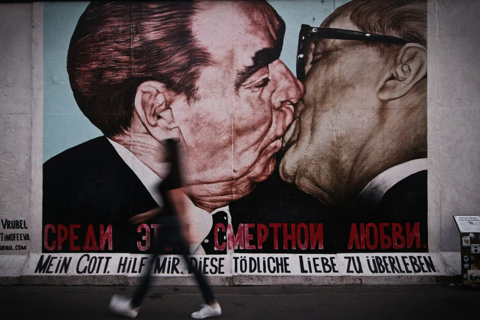 Kreuzberg Street Art — two person kissing wall art