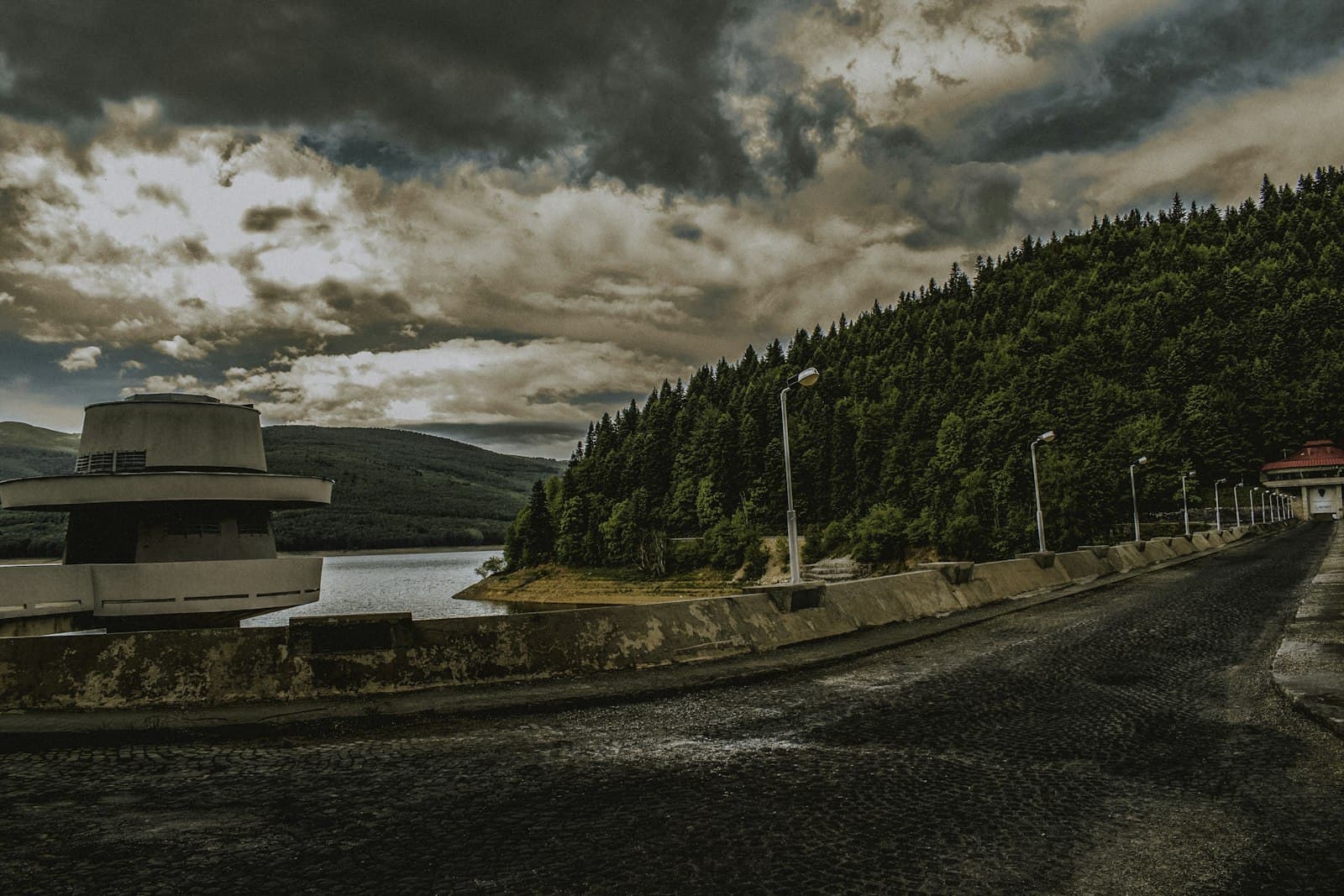 Kruševo — green trees near body of water under cloudy sky during daytime