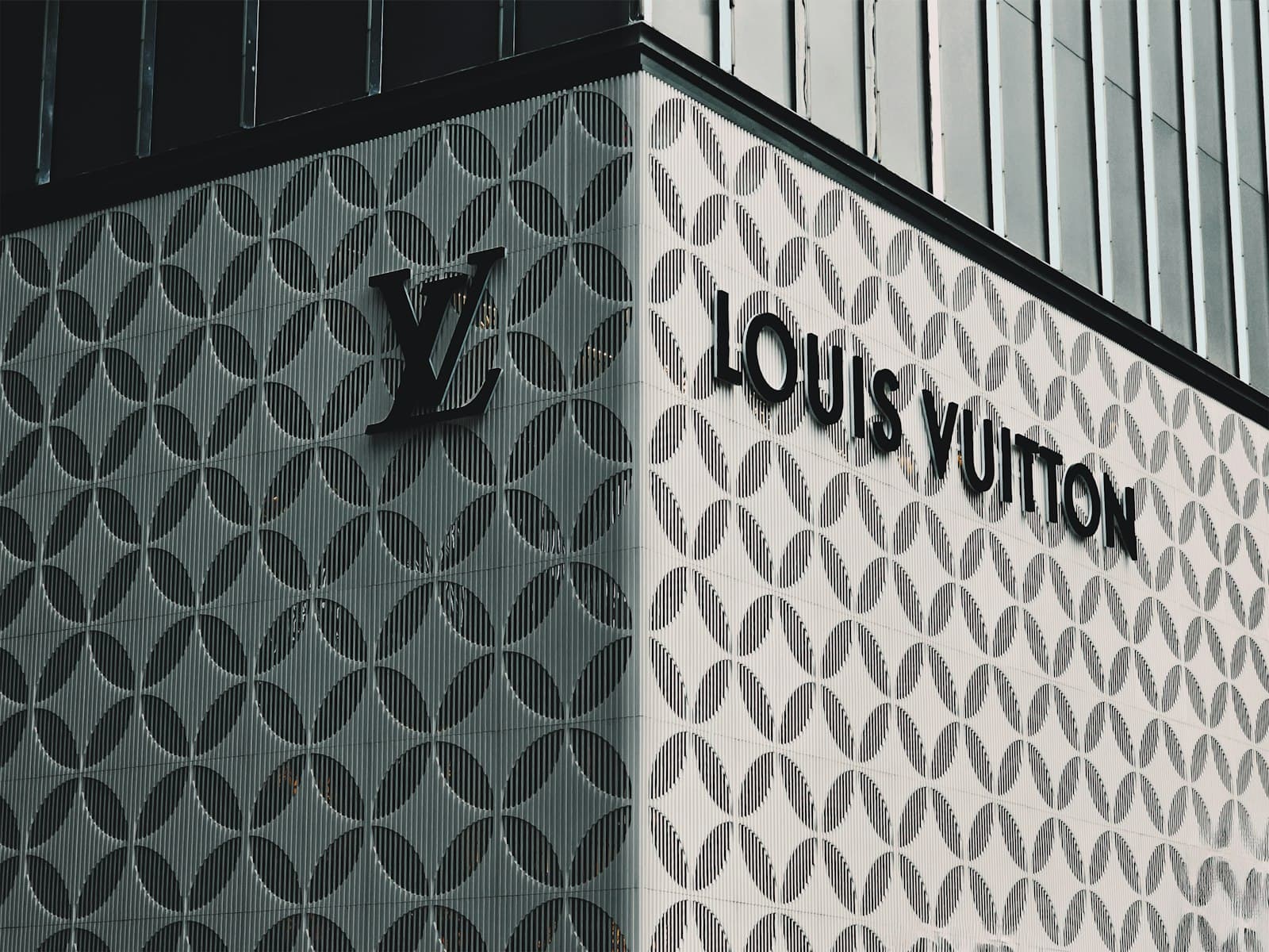 Kuldīga — A louis vuitton sign on the side of a building