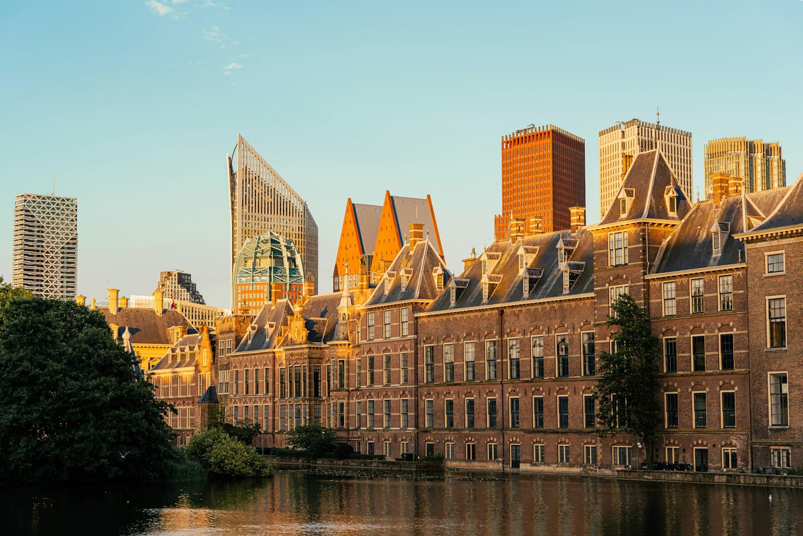 La Haye — A large building with a lot of windows next to a body of water