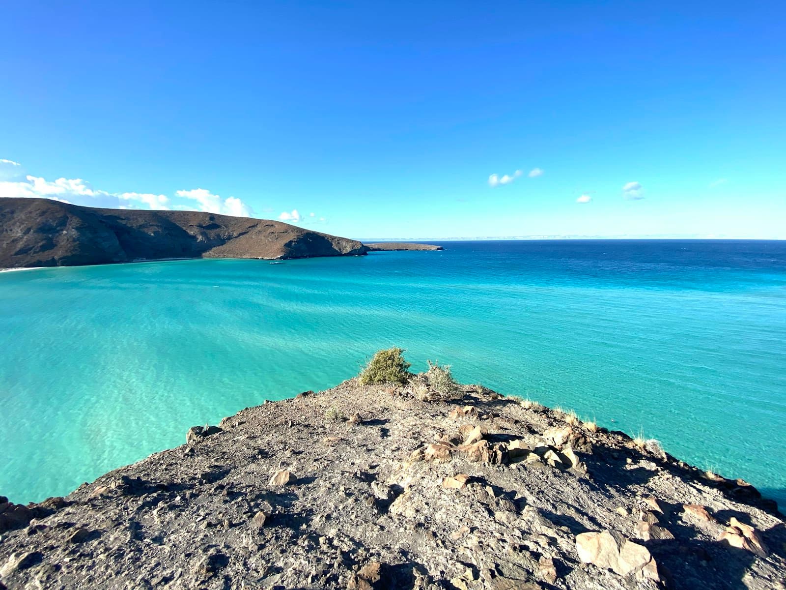 La Paz — blue sea beside brown rocky mountain under blue sky during daytime