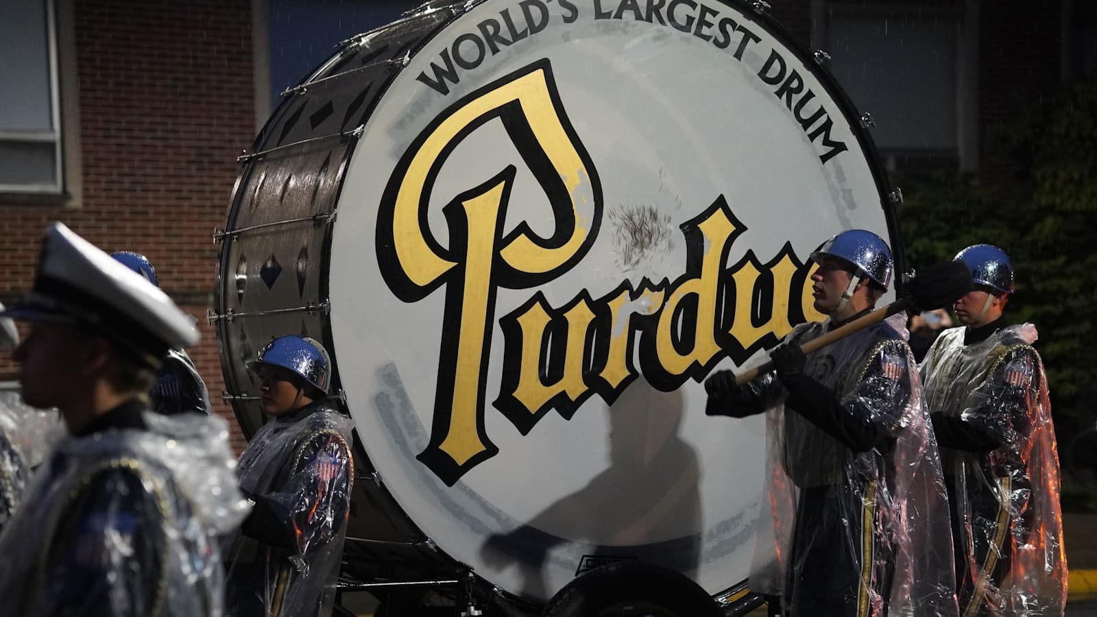 Lafayette — a group of men standing next to a large drum