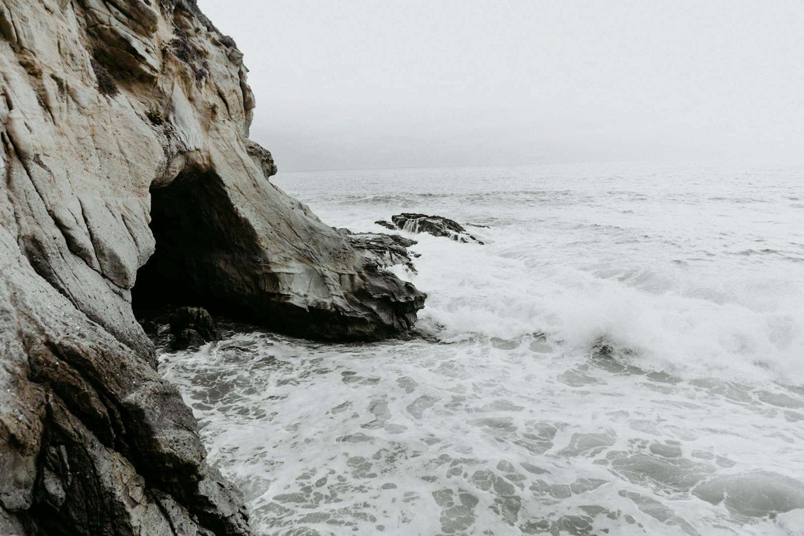 Laguna Beach — gray mountain cliff beside body of water