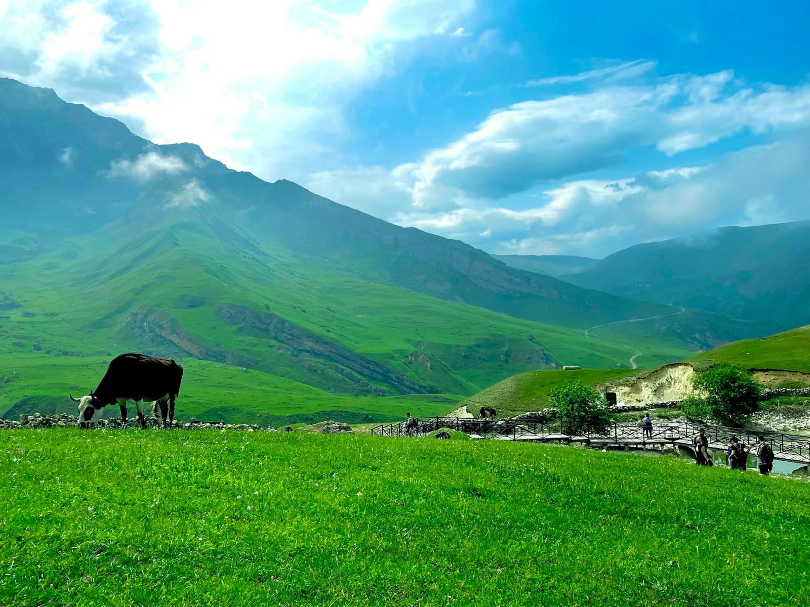 Lankaran — green mountains under white clouds during daytime