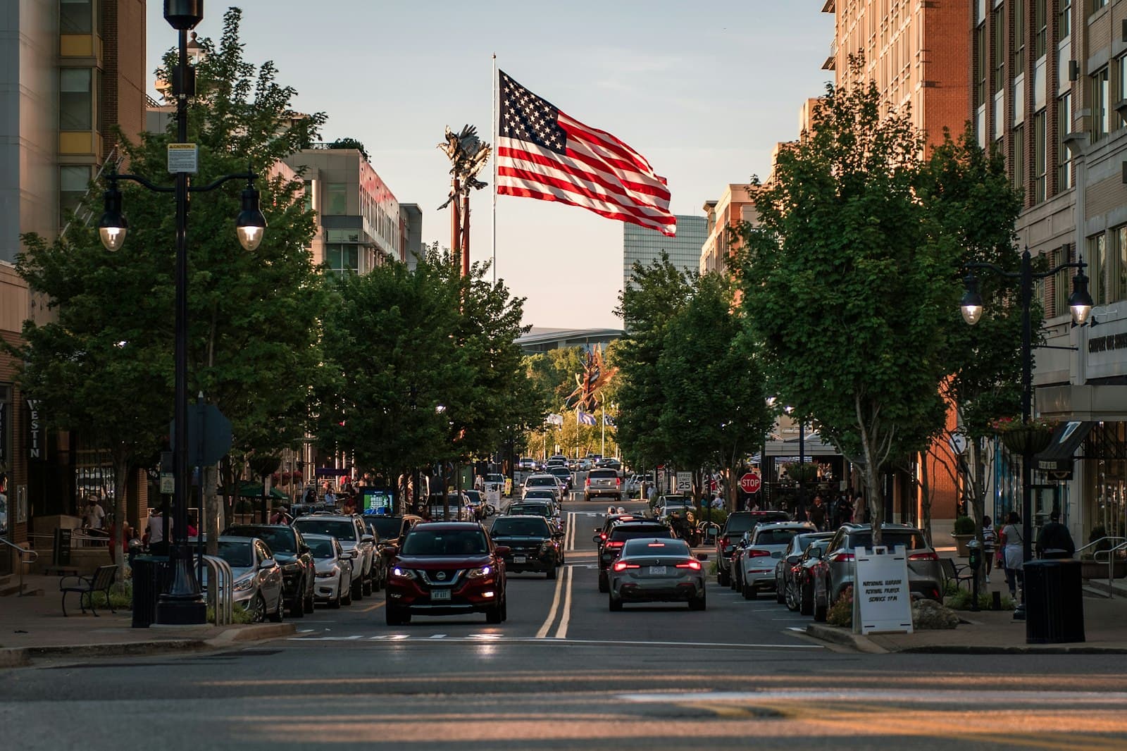 Lansing — American flag waving above national harbor street