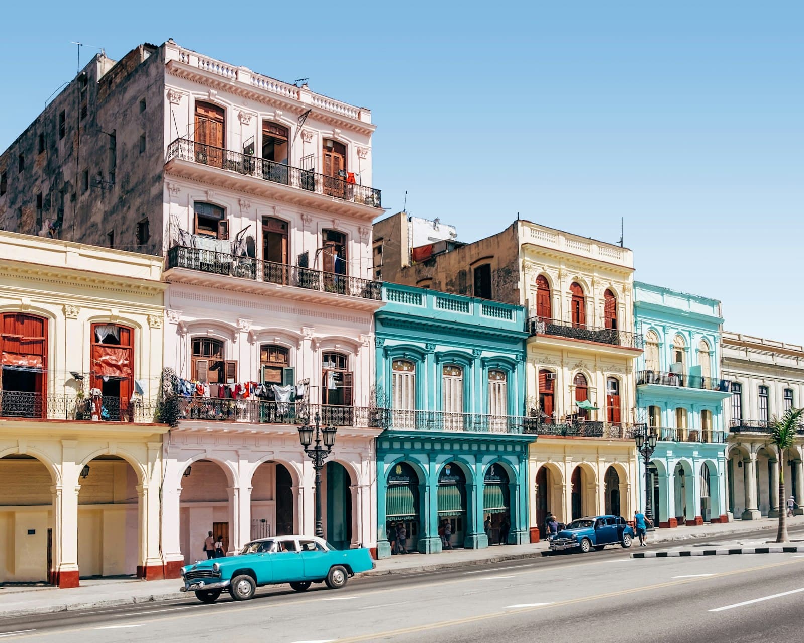 Las Terrazas — two cars parked outside building