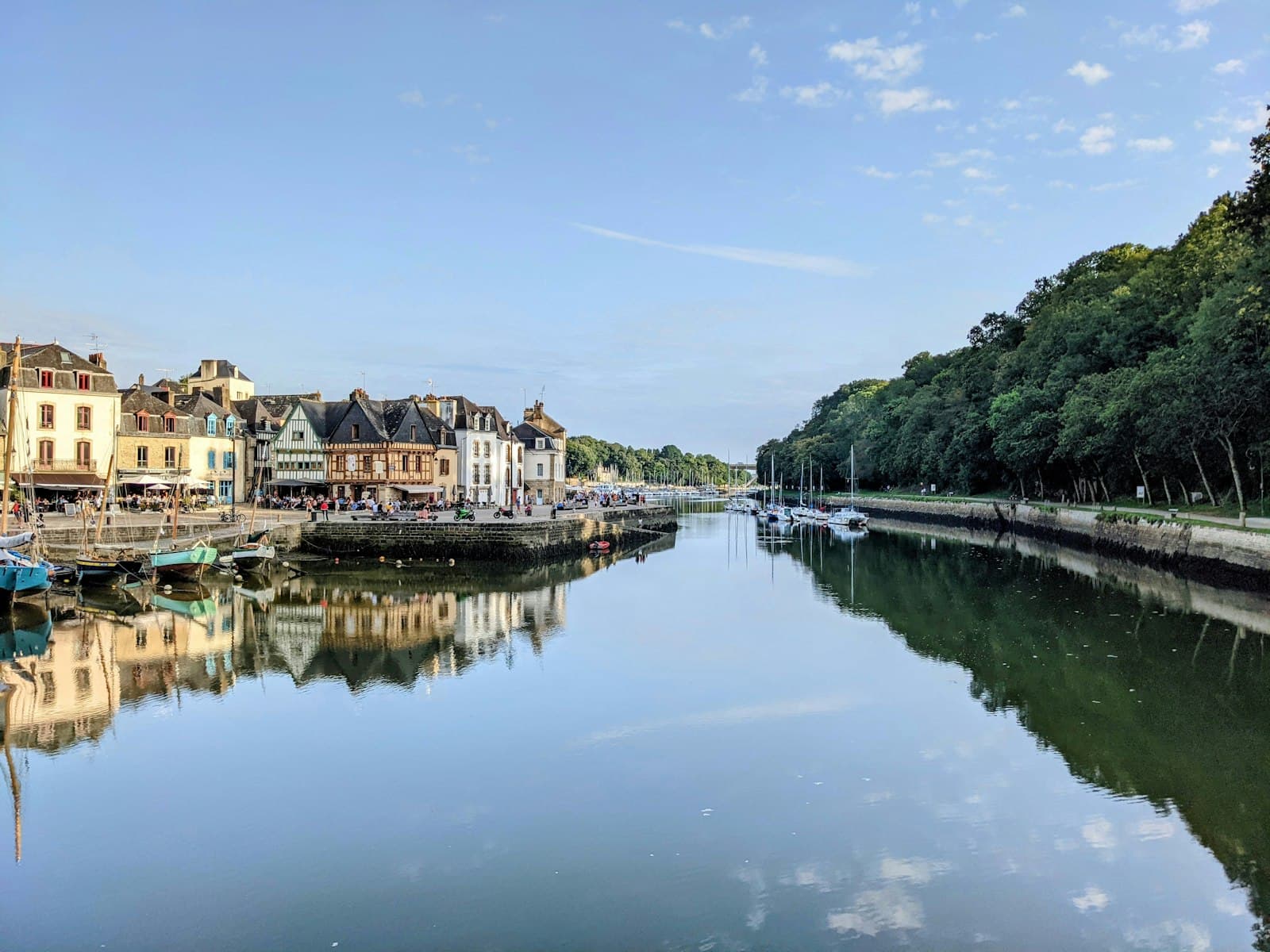 Le Puy-en-Velay — a body of water surrounded by buildings and trees