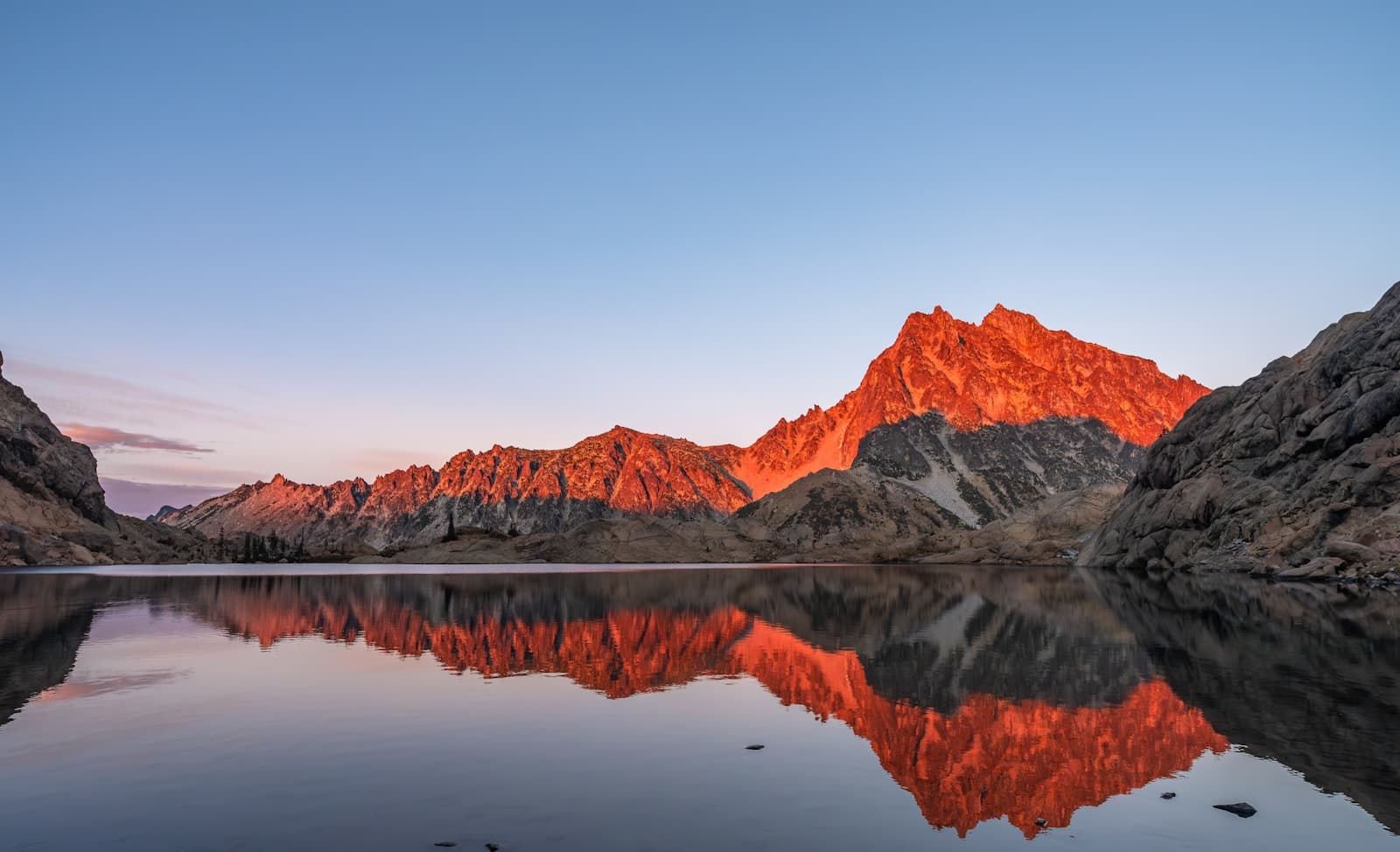 Leavenworth — A mountain range is reflected in the still water of a lake
