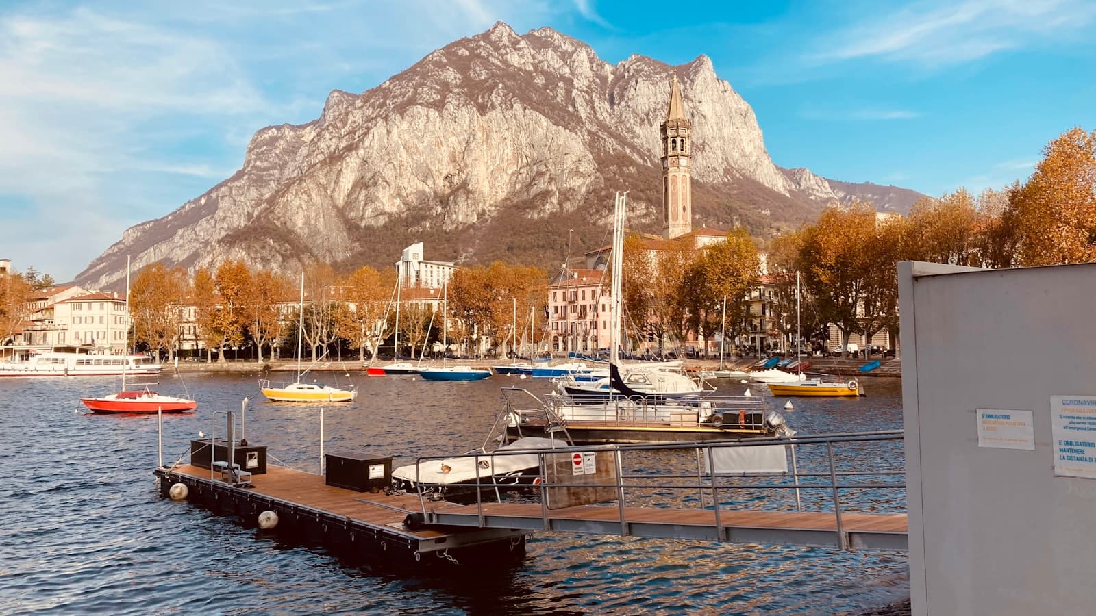 Lecco — white and black boat on dock during daytime