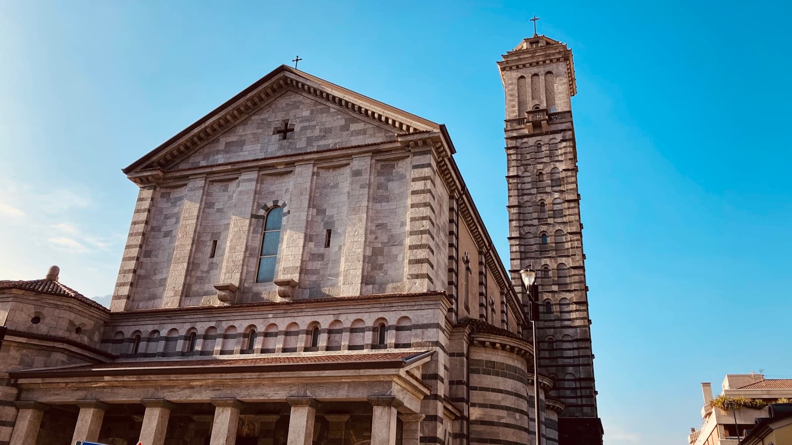 Lecco — brown concrete building under blue sky during daytime