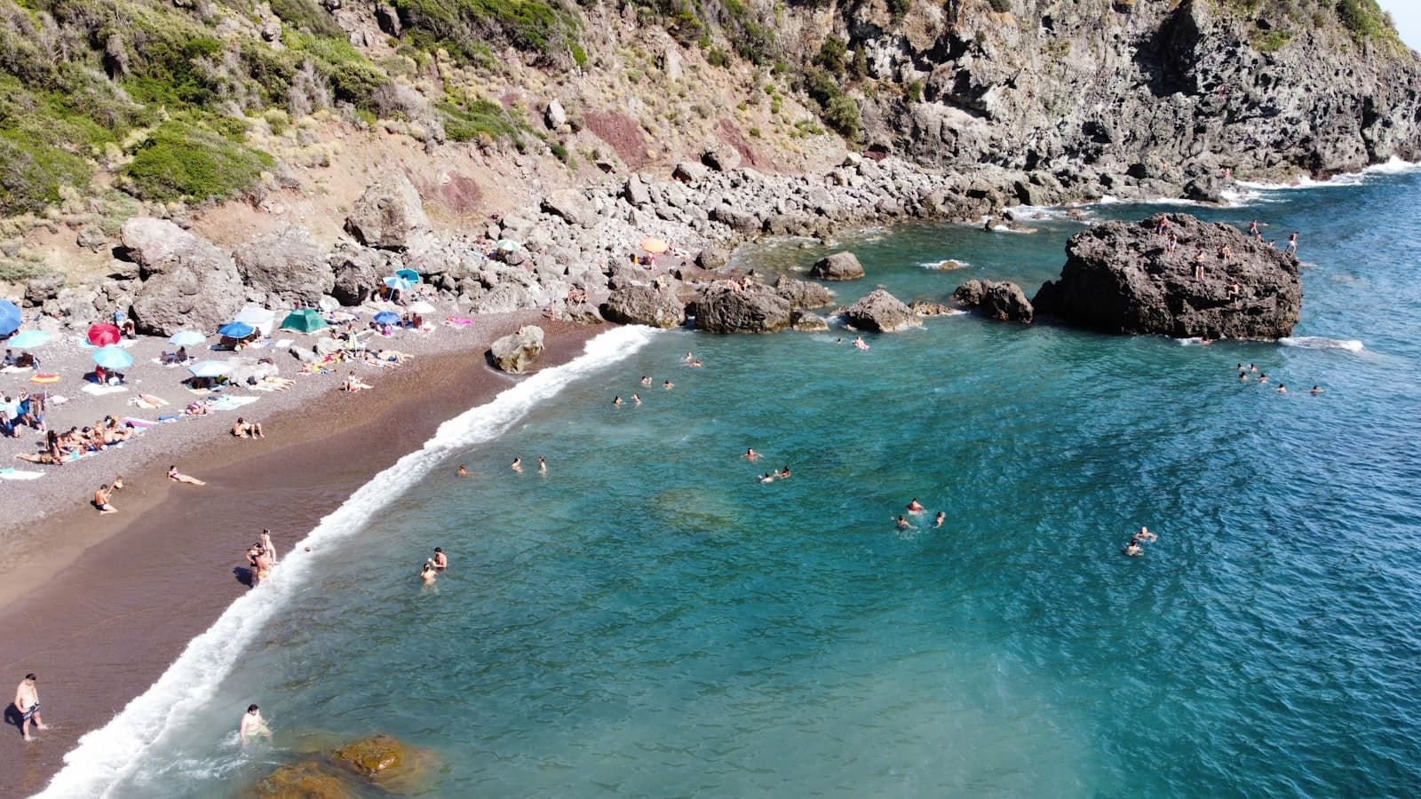 Livorno — a beach with people swimming