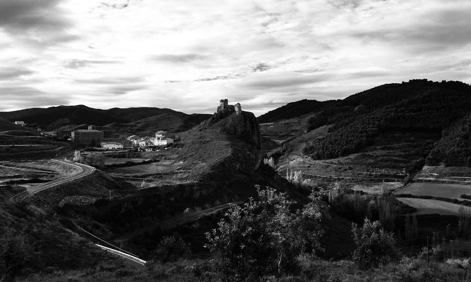 Logroño — a black and white photo of a castle on a hill