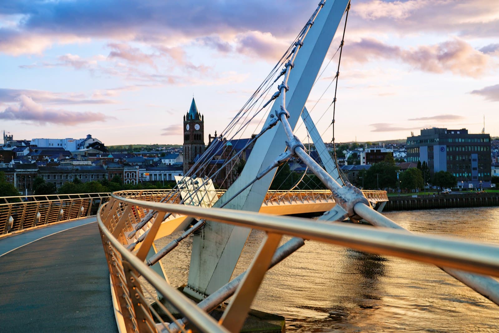 Londonderry — A view of a bridge with a clock tower in the background