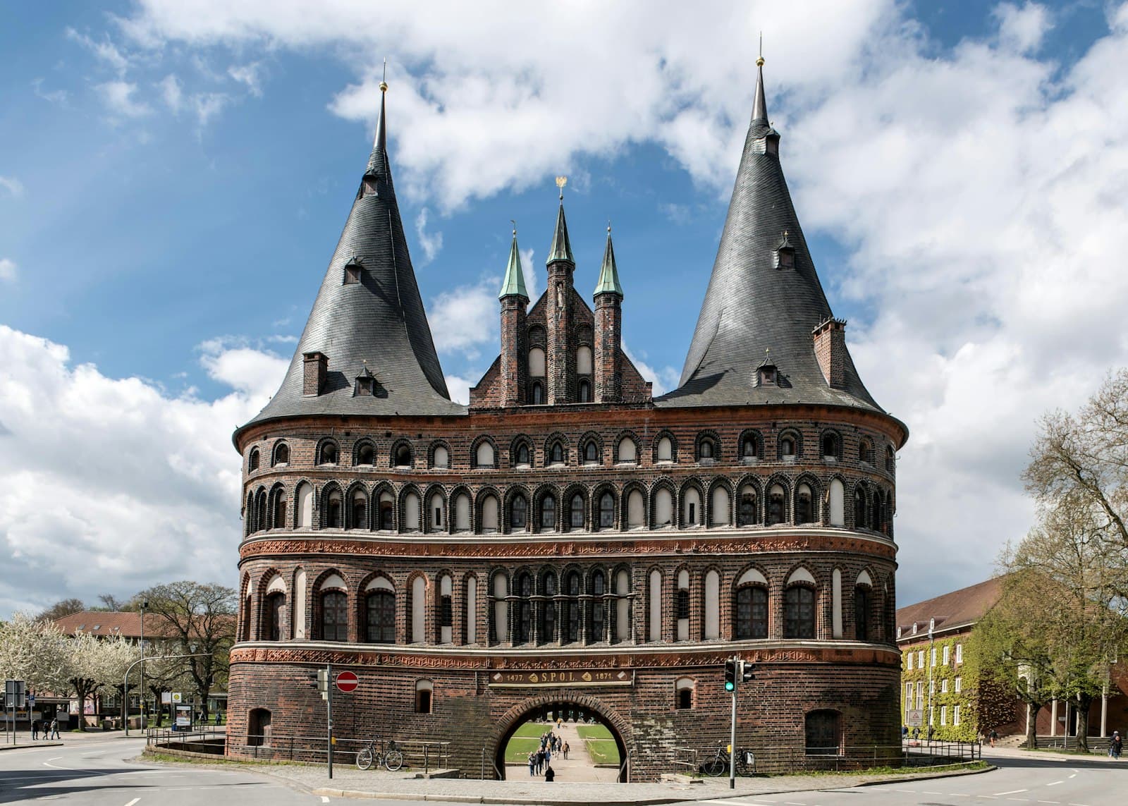Lübeck — a large brick building with two towers on top of it