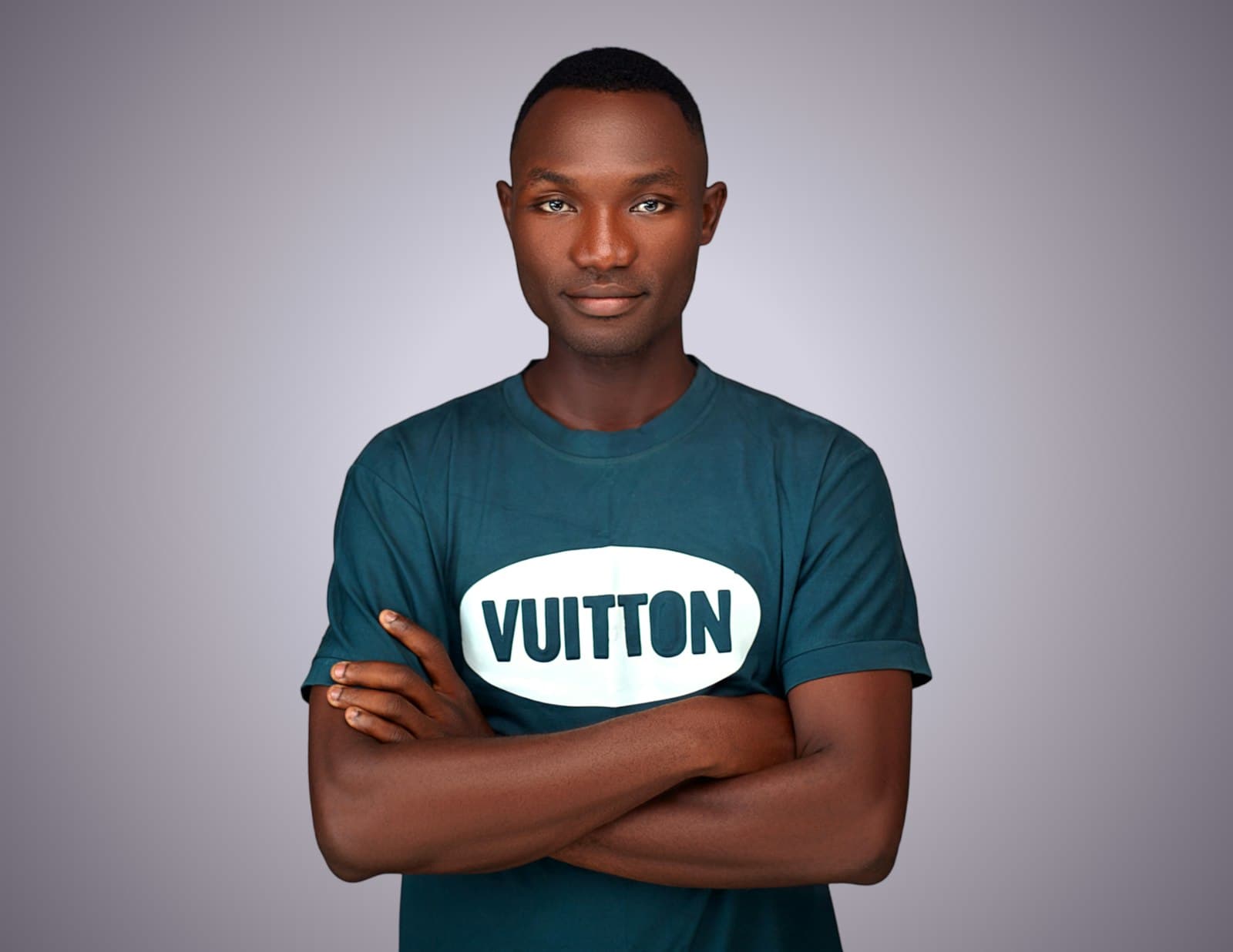 Ludza — A man with his arms crossed and a sign that says vutton on it