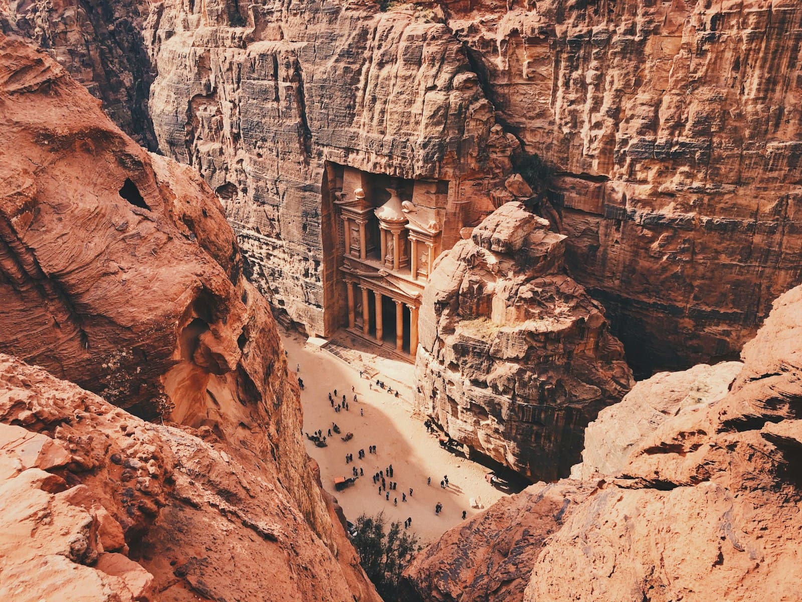 Madaba — brown and white concrete building on brown rocky mountain during daytime