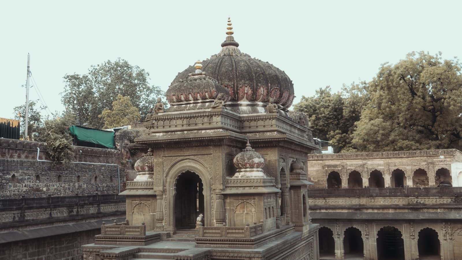 Maheshwar — Ancient stone building with a domed roof.