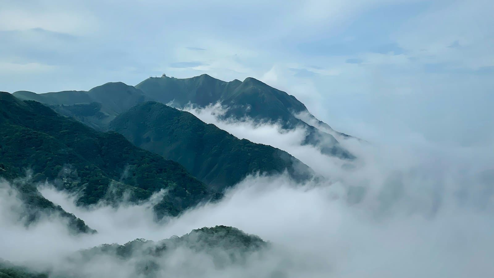 Makung — a view of a mountain range covered in clouds